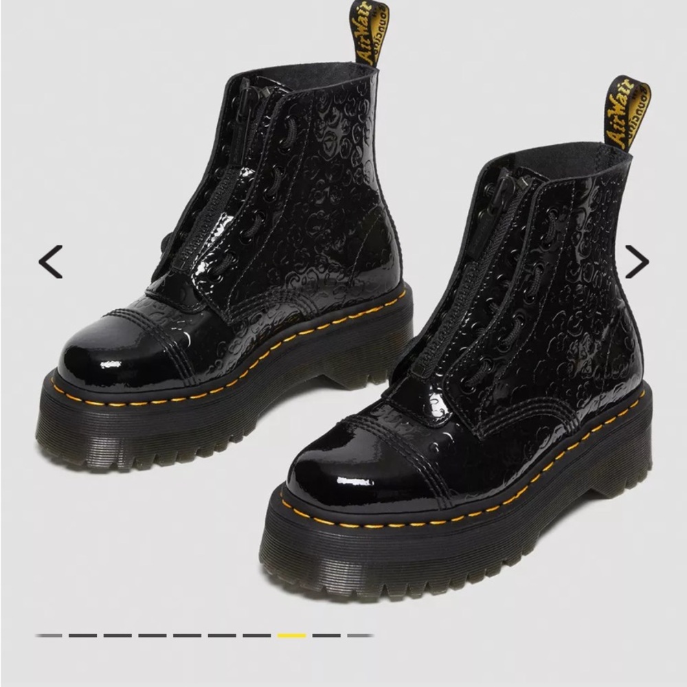 Dr. Martens Leopard Embossed Sinclair Platforms